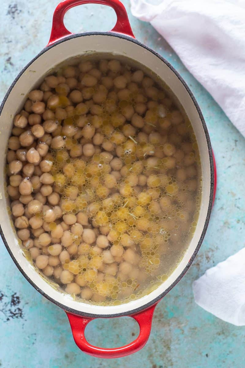 Chickpeas and soffritto in water in a pot