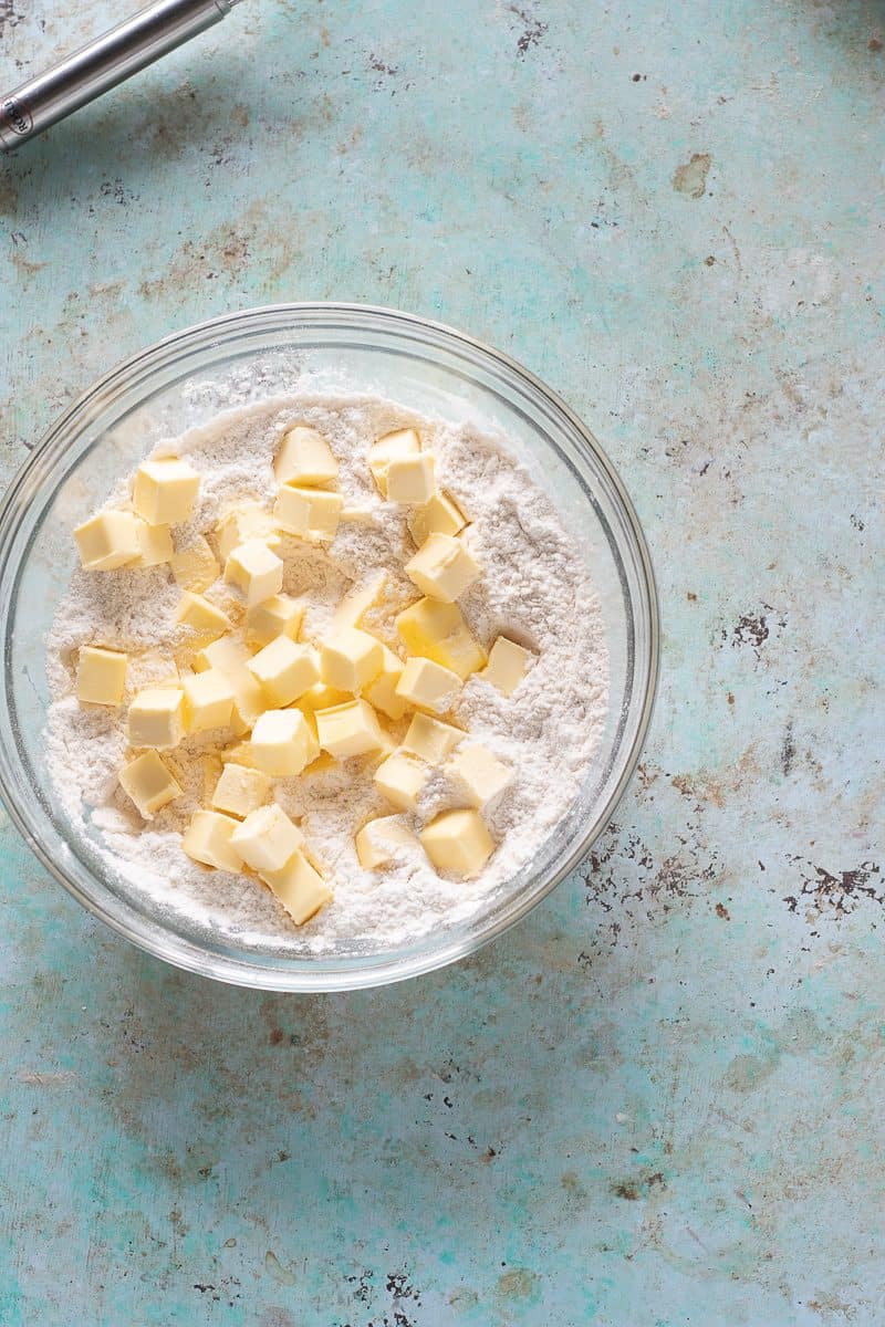 Cubes of butter in a bowl of flour mixture