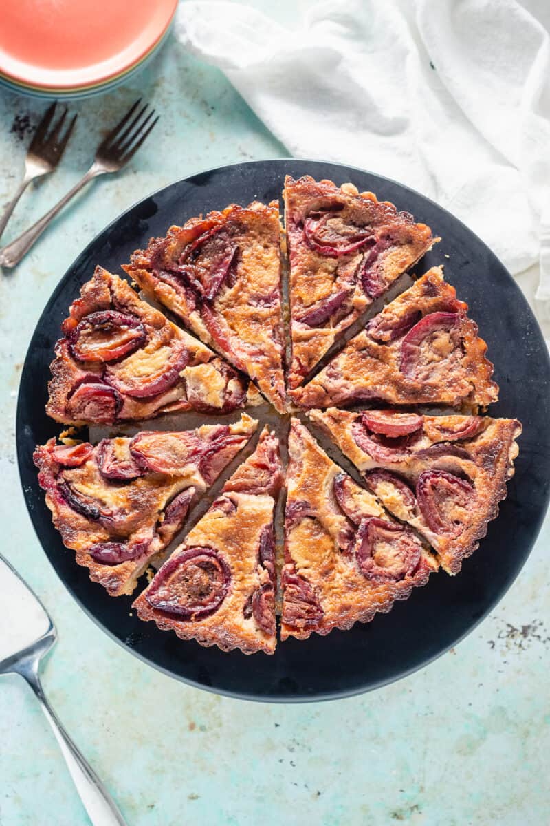 Plum Custard Tart, sliced, overhead view