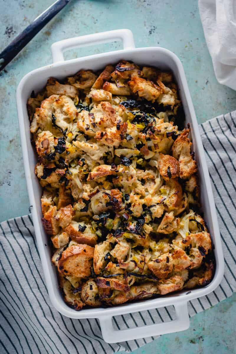 Fennel and Kale Stuffing in a white baking dish