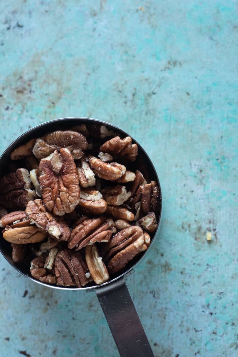 Pecans in a measuring cup