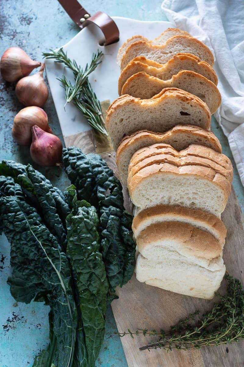 Kale, shallots, rosemary, and slices of bread