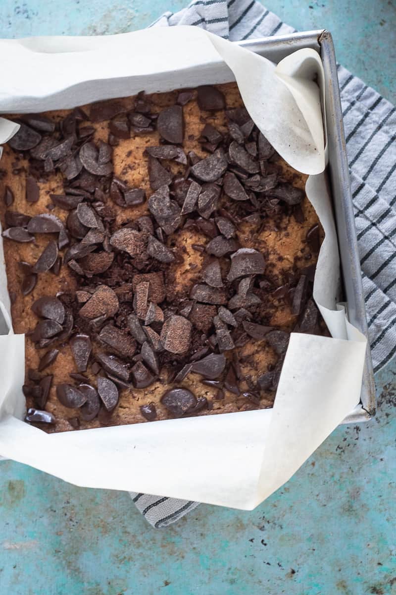 Chocolate sprinkled over the top of the baked cookie base