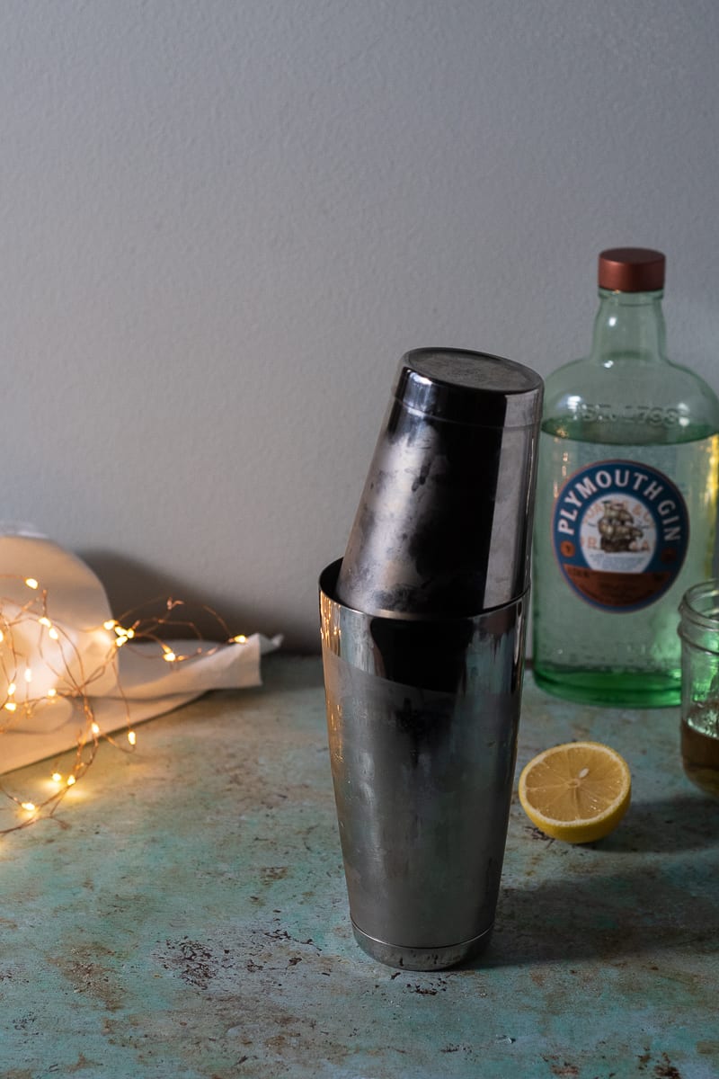 Closed cocktail shaker, cold with visible condensation