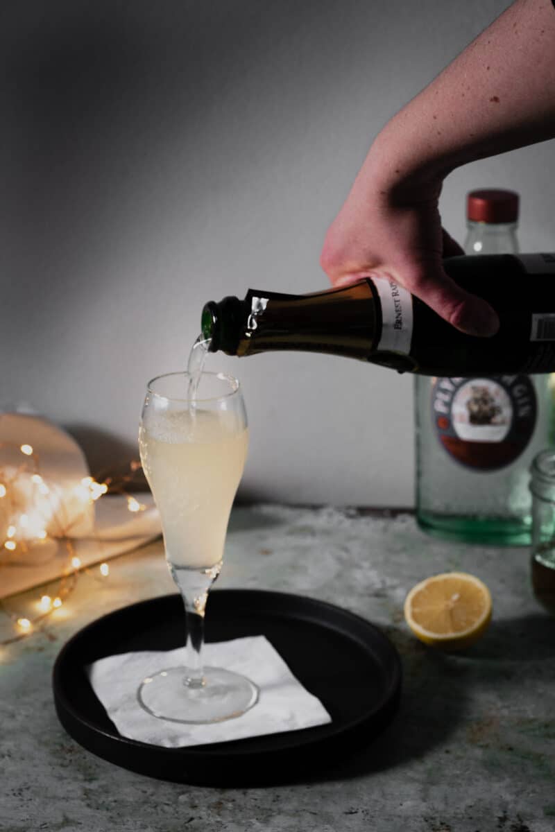 Topping French 75 with champagne