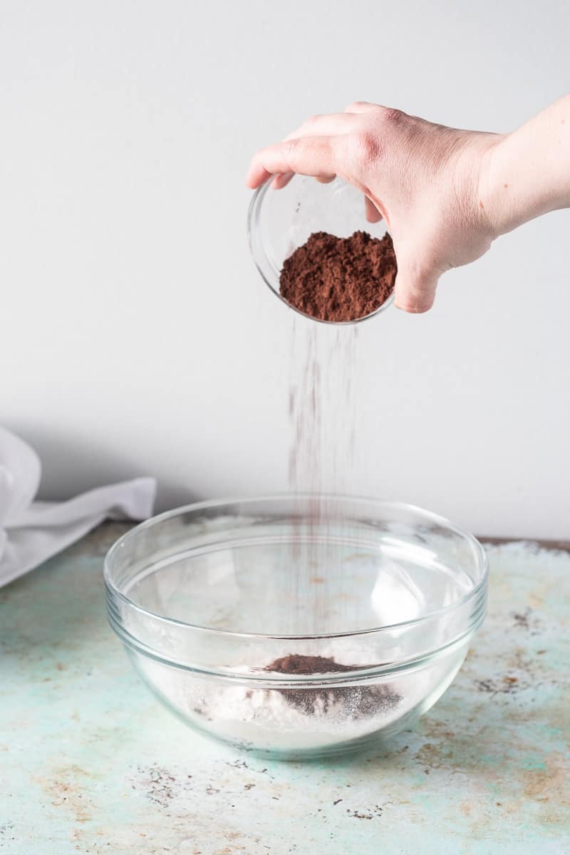 Adding cocoa powder to flour