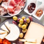 Cheeses, meats, and accompaniments up close