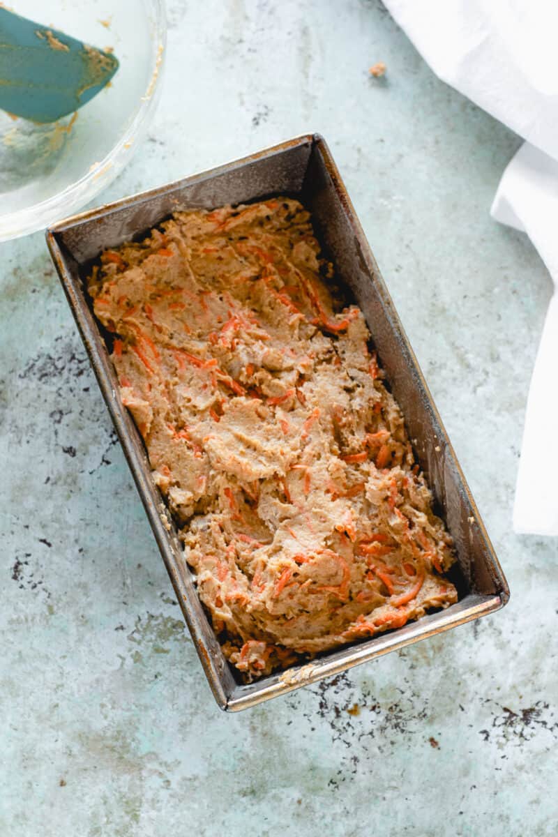 Carrot cake batter in a loaf pan