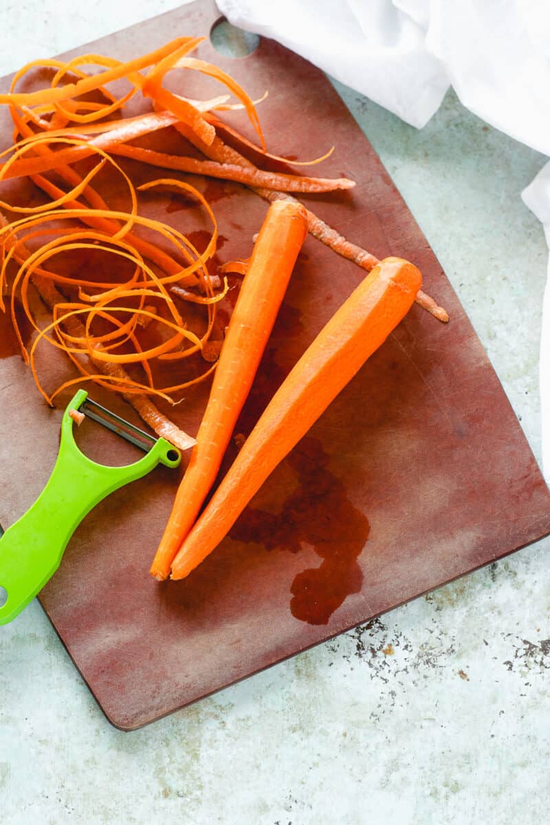 Peeled carrots on a cutting board