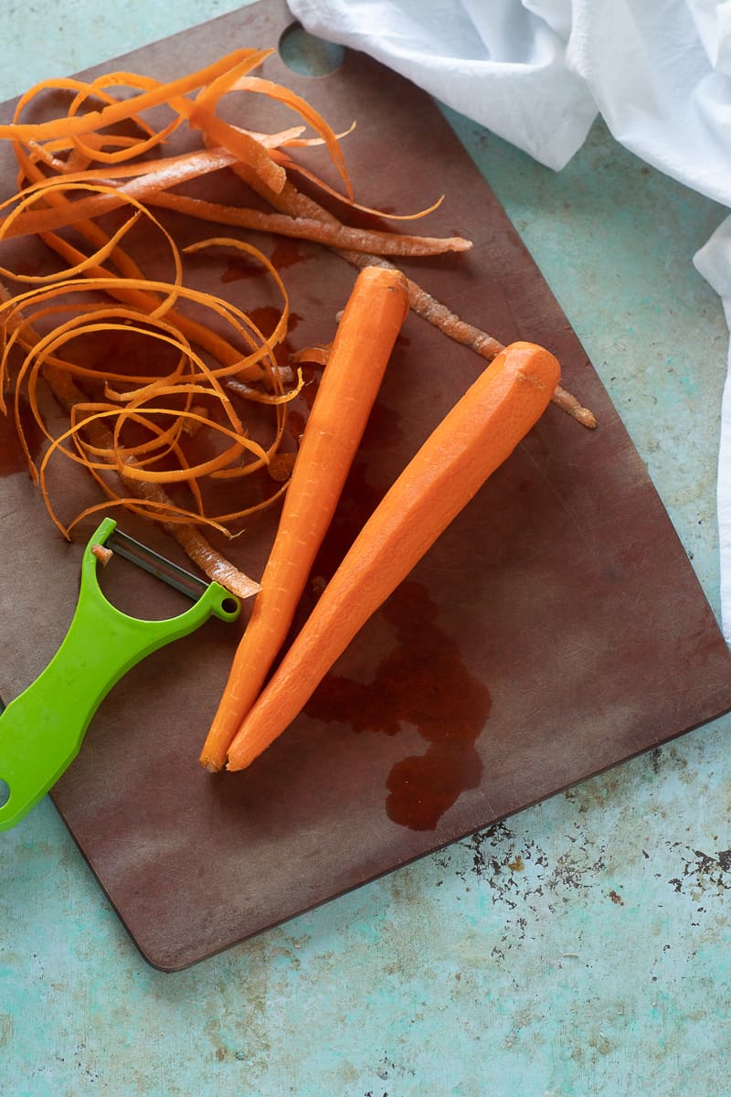 Peeled carrots on a cutting board
