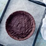 Chocolate Shortbread Tart Crust on a baking sheet