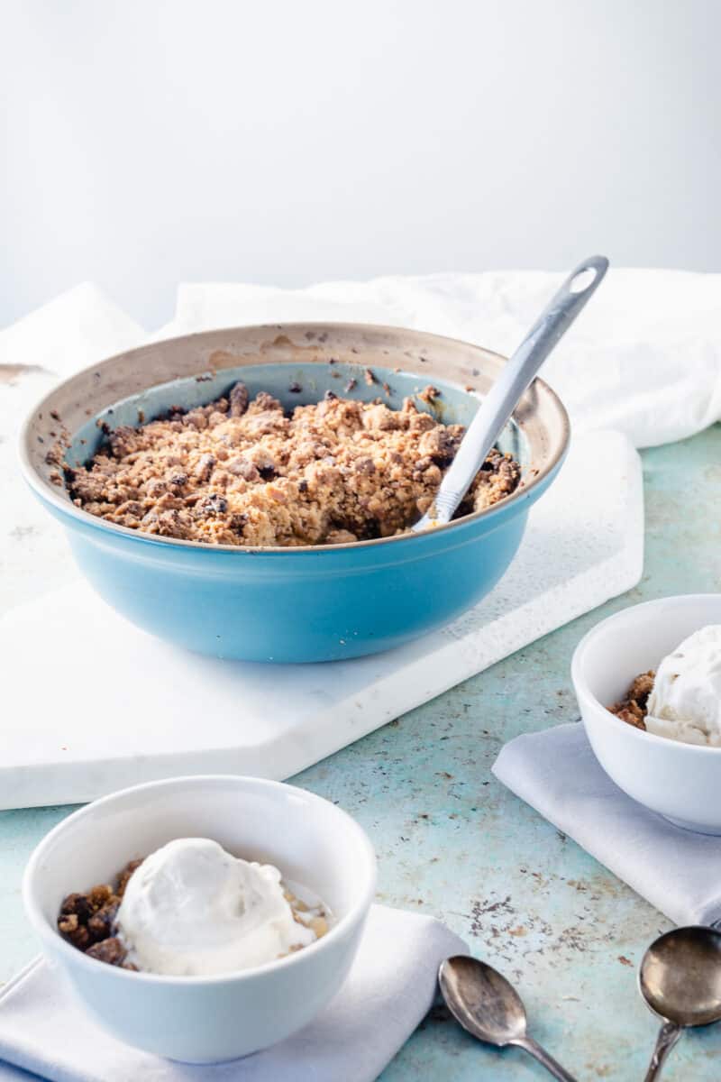 Apple crisp in a blue baking dish