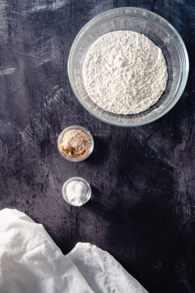 Flour, spices, baking powder and salt in mixing bowls