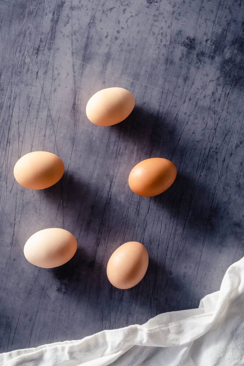 Five eggs on a counter