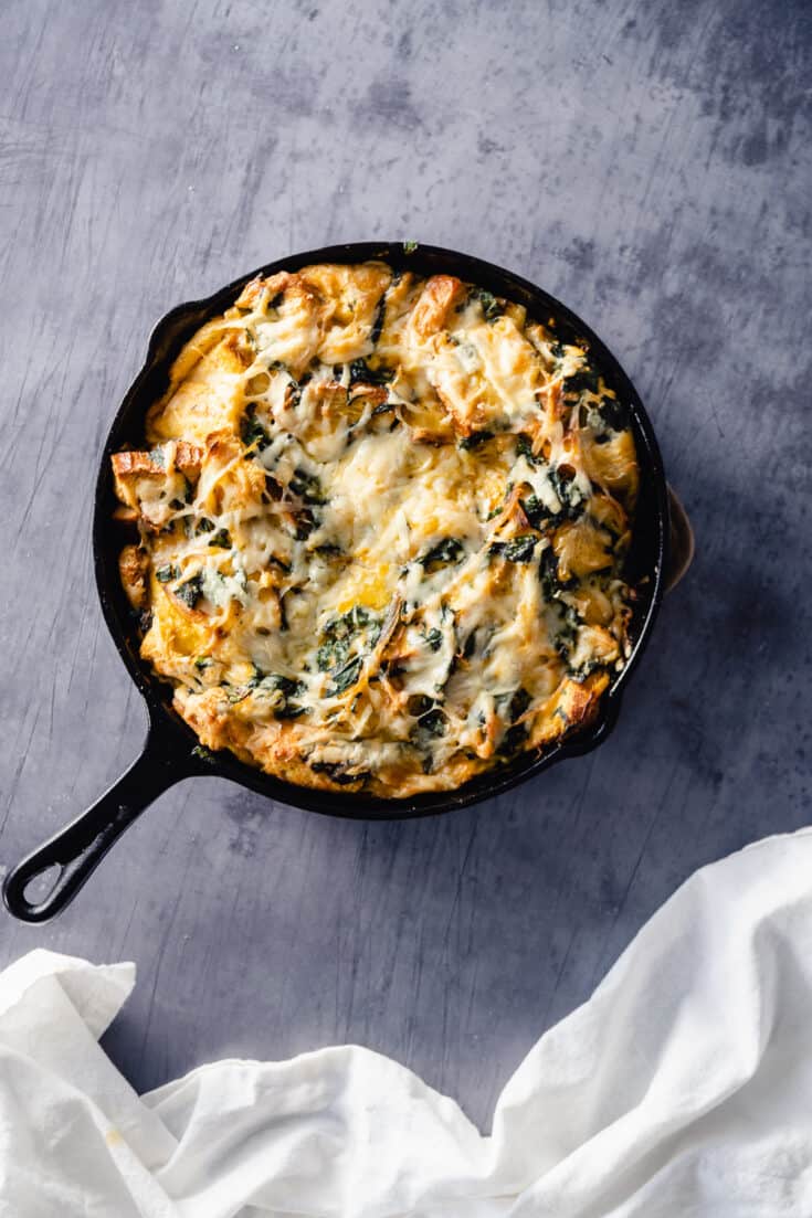 Swiss Chard and Gruyere Strata in a cast iron skillet