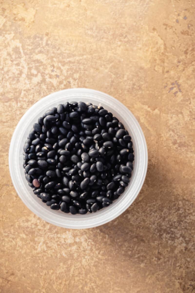 Black beans in a deli container