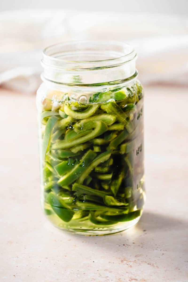 Quick Pickled Poblano Peppers in a mason jar