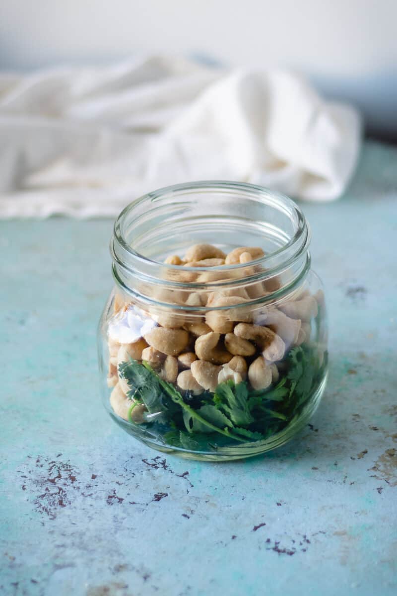 Jar with cilantro and peanuts