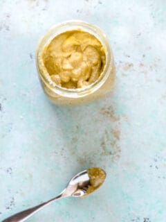 Garlicky cashew sauce in a jar, overhead view