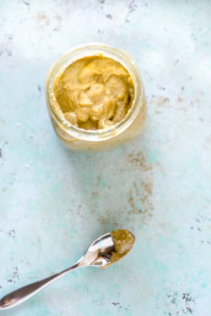 Garlicky cashew sauce in a jar, overhead view