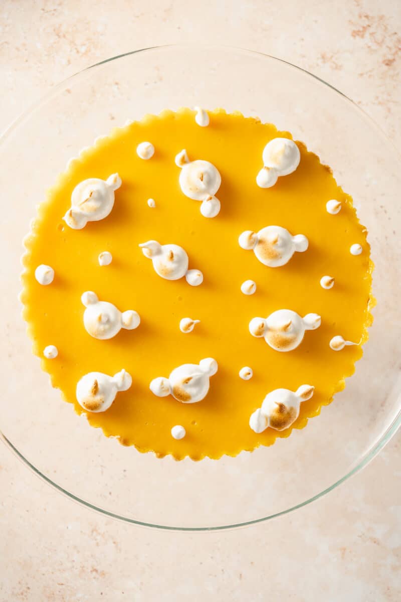 Lemon Ginger Tart on a glass cake stand, overhead view