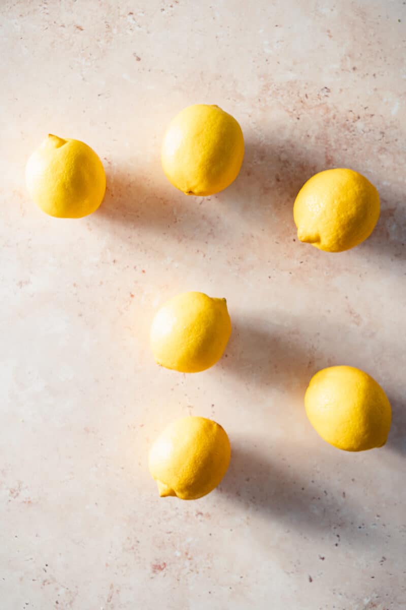 Six lemons on a counter