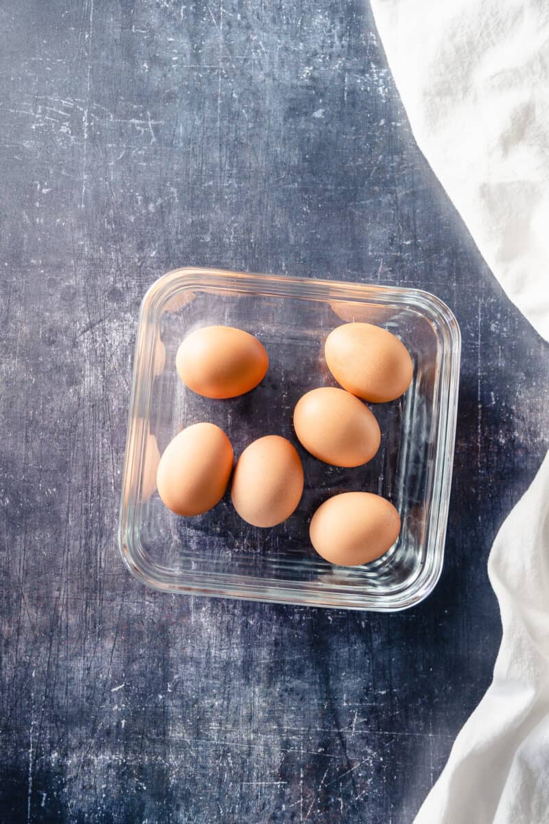 Hard boiled eggs in a glass container