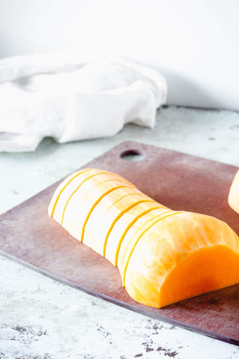 Sliced butternut squash on a cutting board