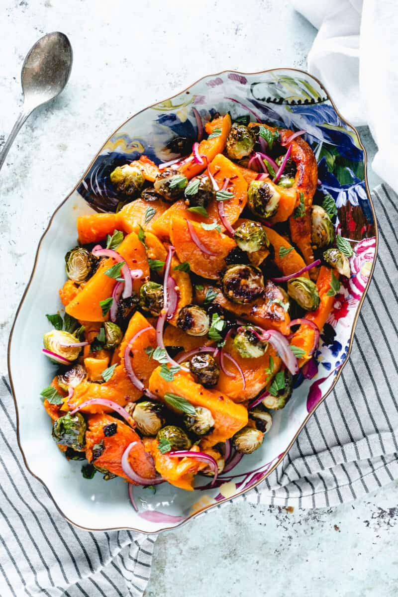 Butternut Squash and Brussels Sprouts in Agrodolce on an oval tray